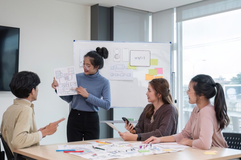 Brainstorming session for the creative team of designers in application design and implementation