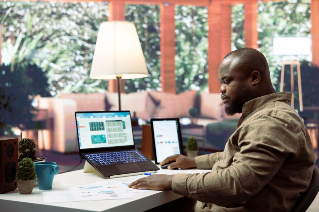 Executive officer reviewing infographics on sales invoices